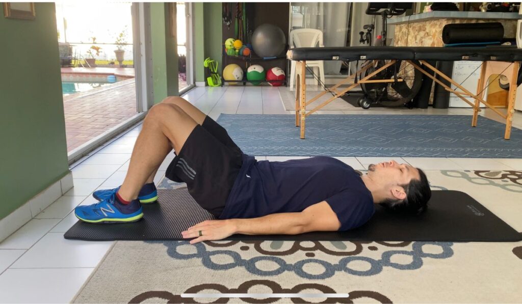 low back tightness alleviate core supine bridge exercise. low back health