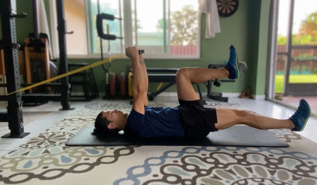 The dead bug with Over head pull is an exercise that strengthens the core and creates an extension bias to fight.