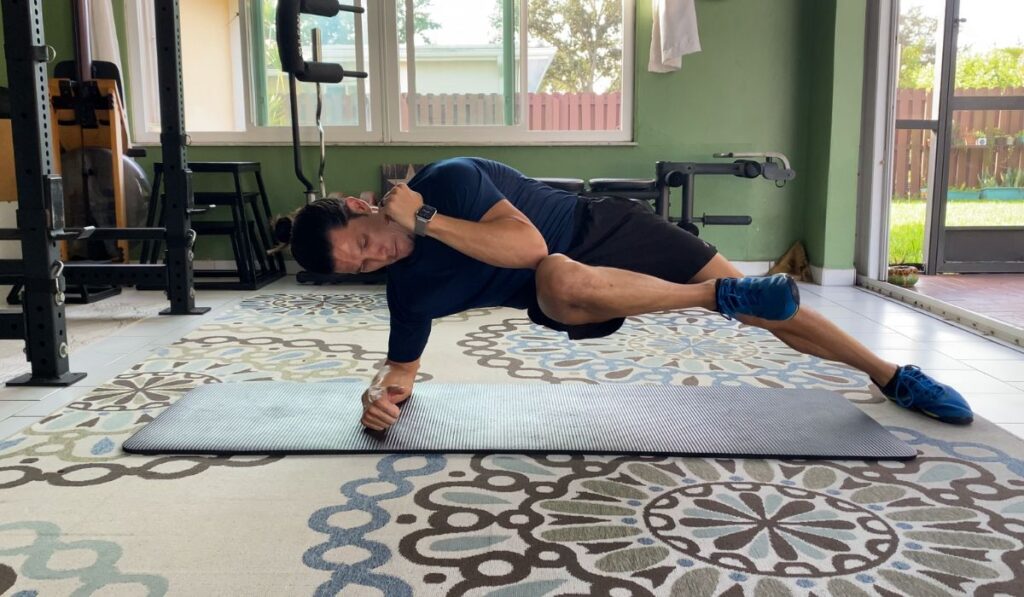 The side plank cross connect is a core exercise that strengthens the bottom sides obliques and top legs adductors.