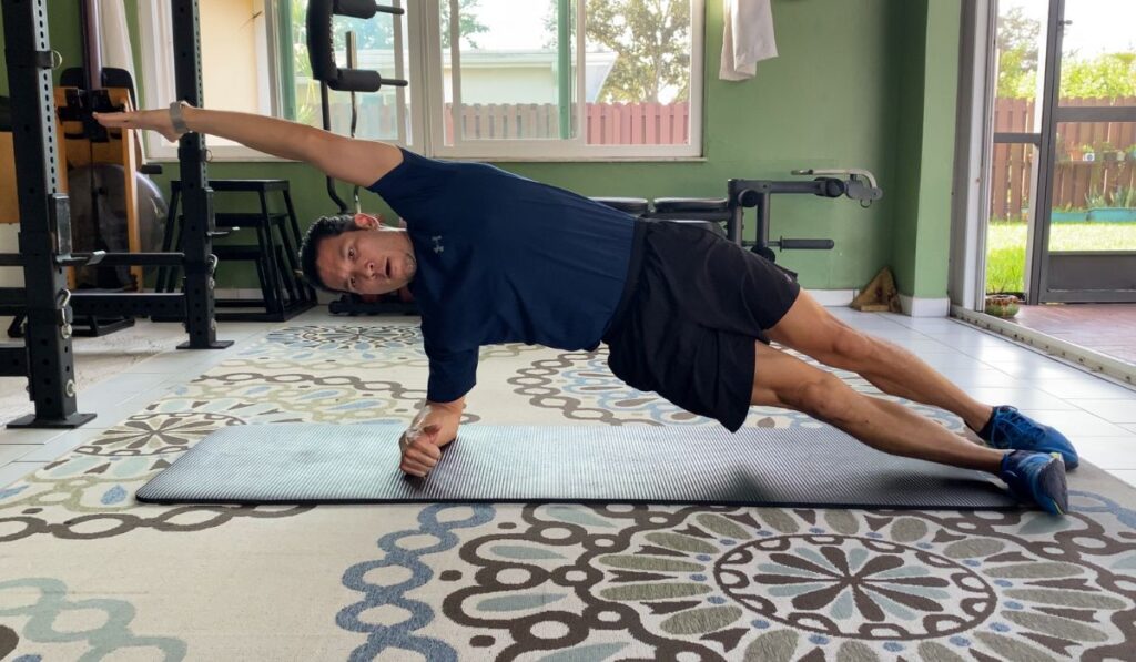 The side plank cross connect is a core exercise that strengthens the bottom sides obliques and top legs adductors.