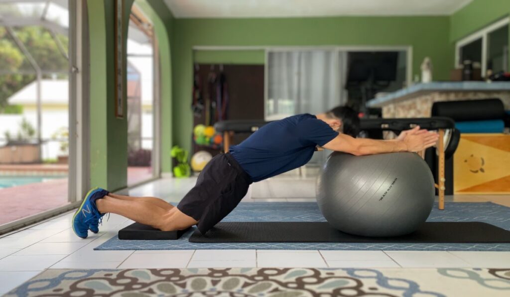 The stability ball roll out is a core exercise that strengthens the abs to fight extension.