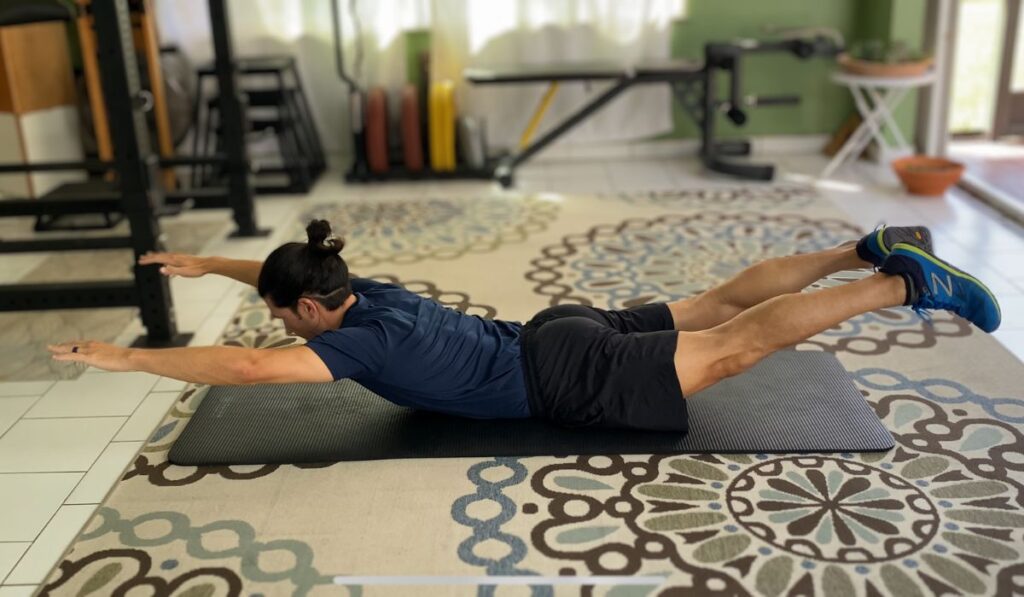 The superman exercise works extension in the hips and back. This exercise strengthens the core and glutes.