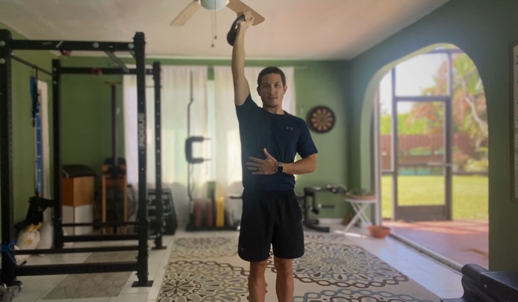 The waiters carry is an exercise with the arm straight overhead carrying a weight. Kettle bells have the most versatility to make this exercise challenging.